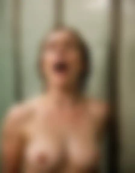 Zoe's orgasm in a large, echoing men's shower area.