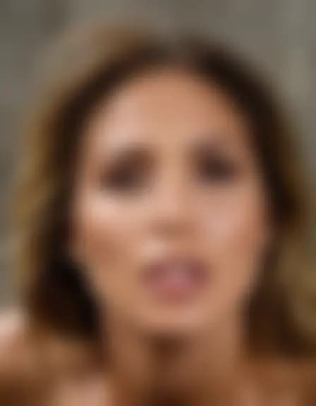 Ella enjoys a facial cumshot in a harsh industrial stairwell.