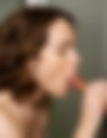 Zoe gives a blowjob in the manager's office, after hours.