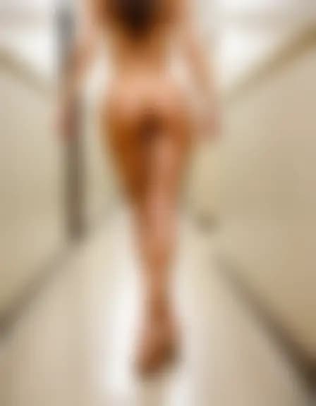 Charlotte is fingered in a narrow hallway with exam rooms and a reception area of a clinic.
