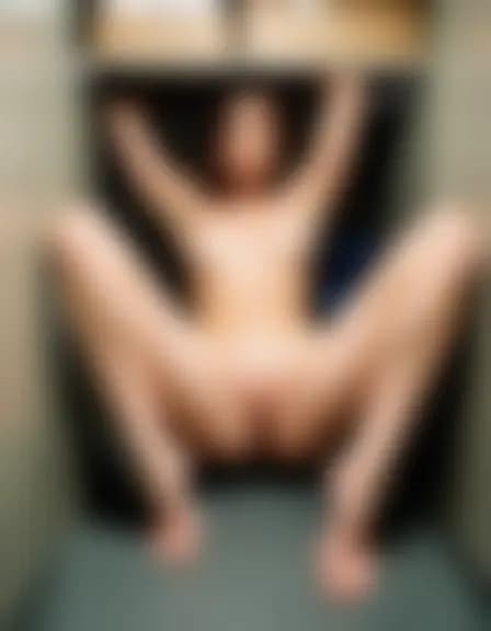 Lillian fingers herself in a small, fluorescent-lit utility closet.