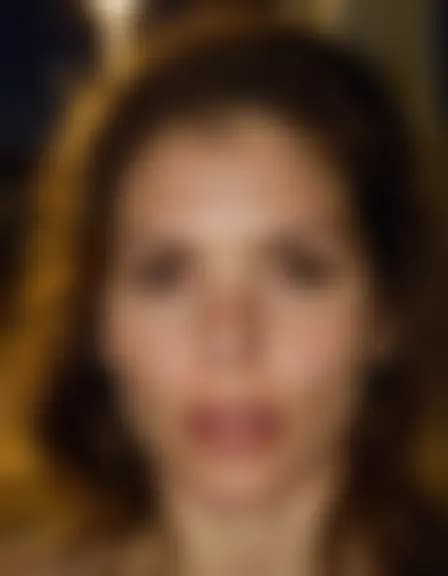 Samantha gets a facial cumshot in a secluded lot corner, lit by a street lamp, foggy windows.